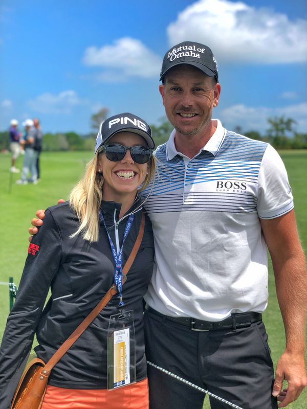 Pernilla Lindberg with Henrik Stenson on a practice range