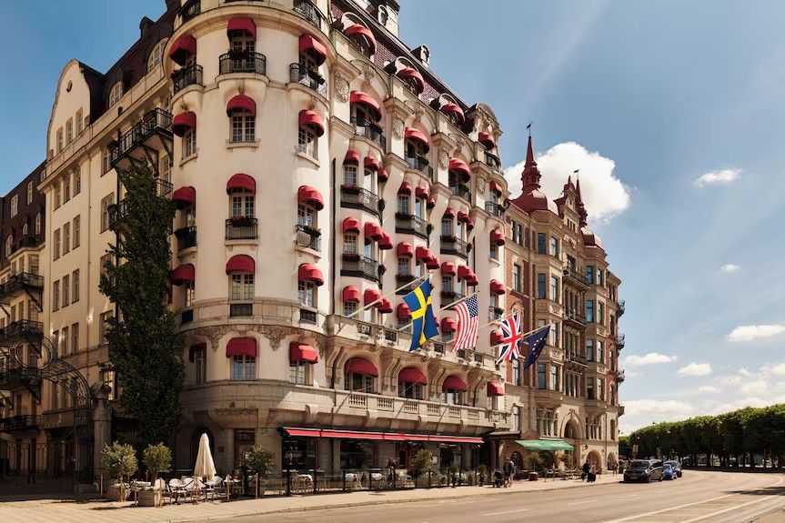 The Art Nouveau façade of Hotel Diplomat on Strandvägen, with flags above the entrance
